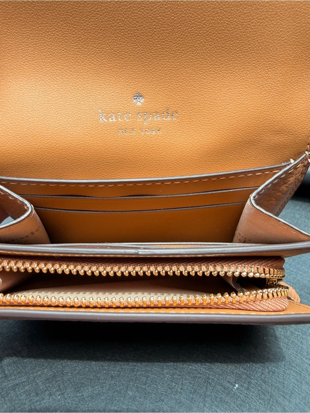 kate spade Peach Pebbled Leather Continental Wallet with Spade Emblem